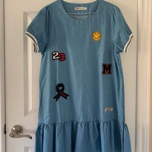 Faux denim drop waist dress w/ embroidered patches